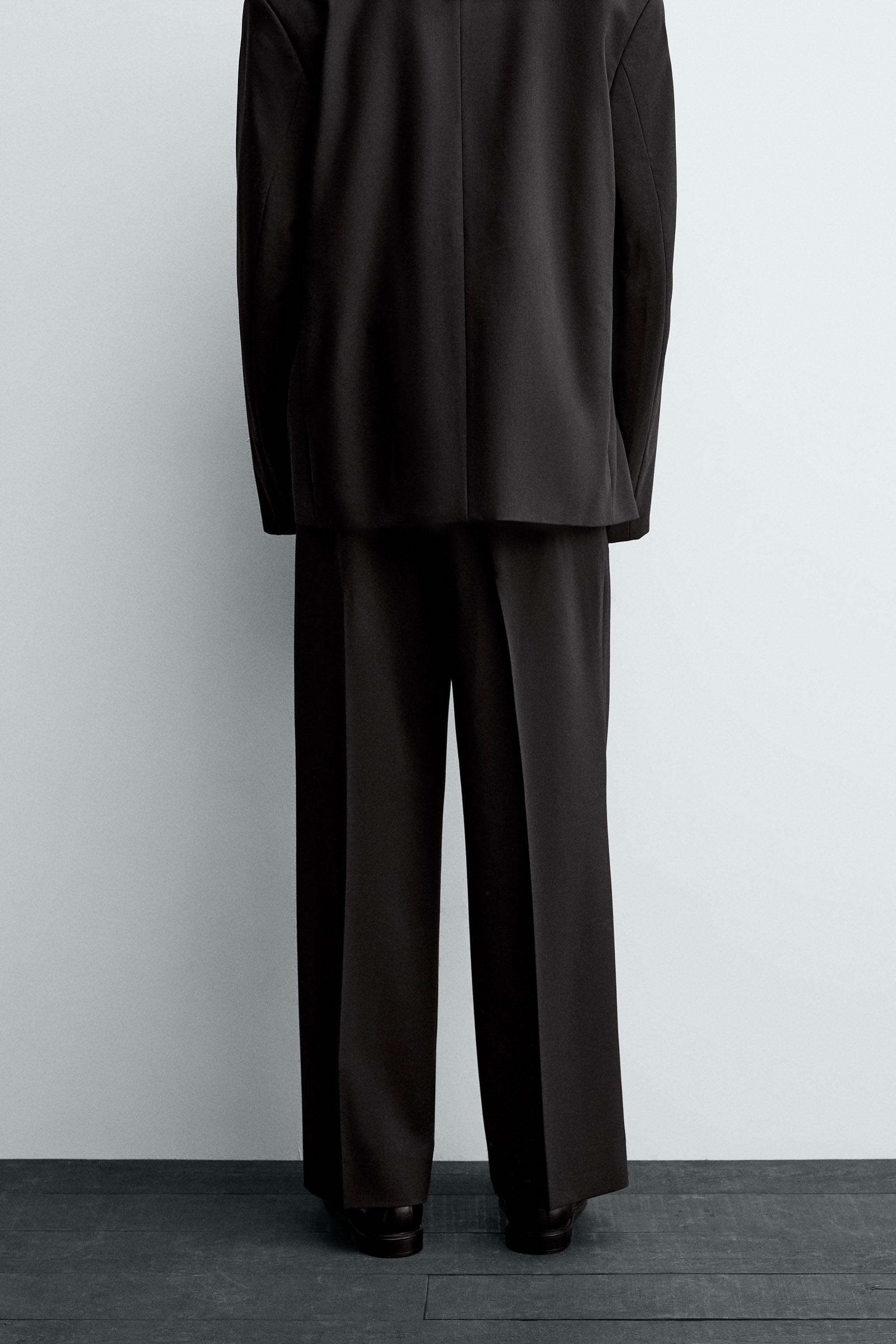 PLEATED SUIT PANTS